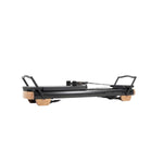 NOHRD Coreformer | Reformer de Pilates y musculación de madera maciza | Espace Sport